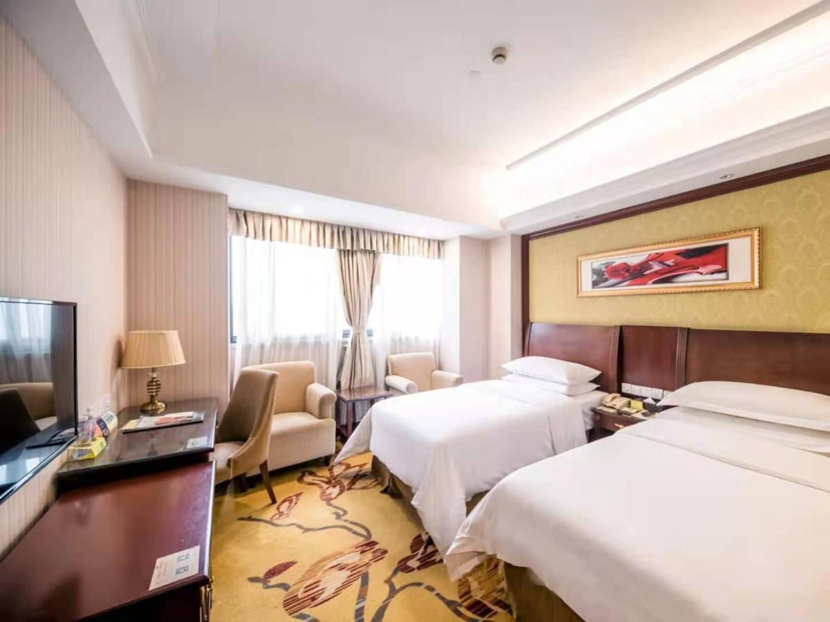 Vienna International Hotel Shanghai Pudong Xiupu Road Exterior photo