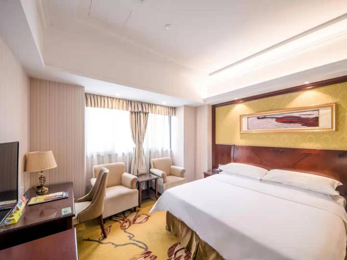 Vienna International Hotel Shanghai Pudong Xiupu Road Exterior photo