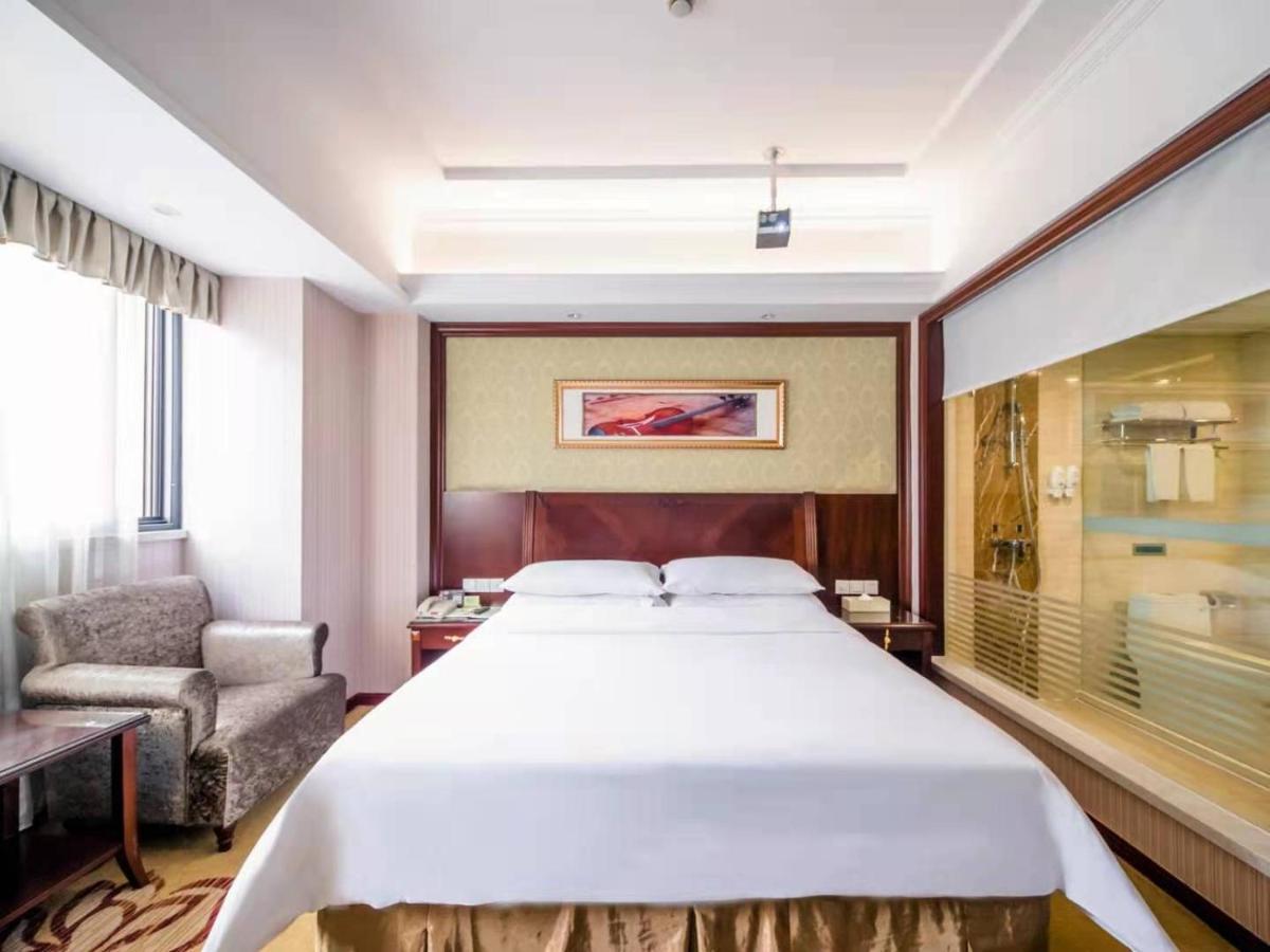 Vienna International Hotel Shanghai Pudong Xiupu Road Exterior photo