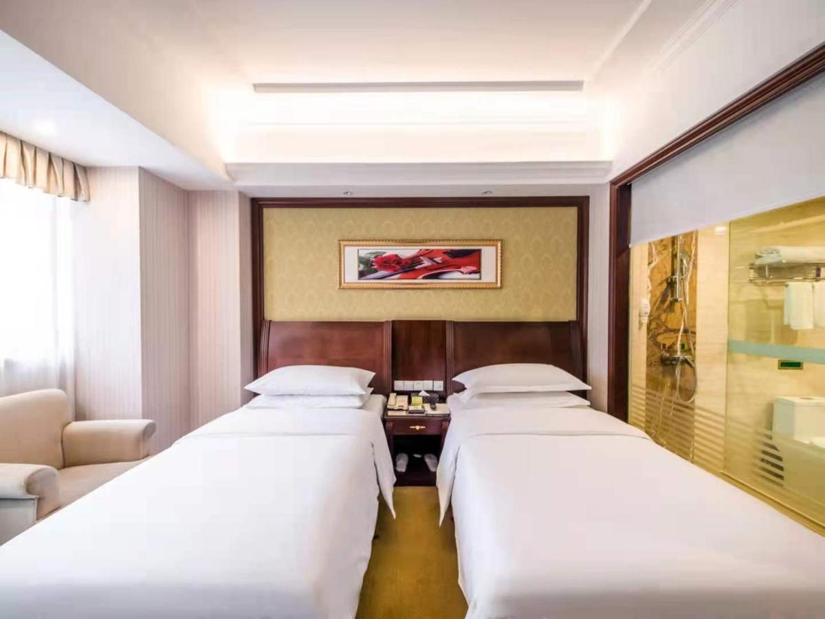 Vienna International Hotel Shanghai Pudong Xiupu Road Exterior photo